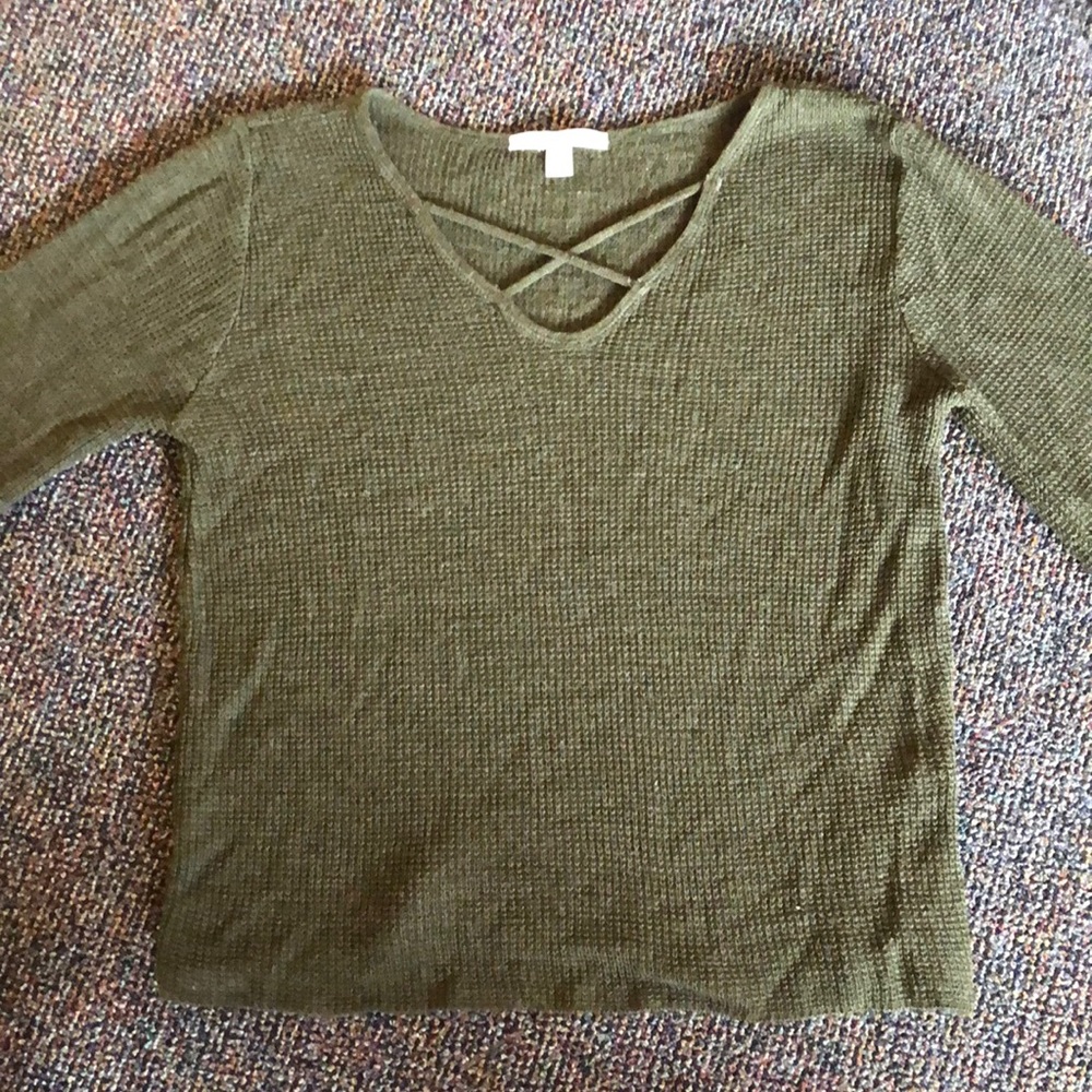 Lightweight green knit sweater with chest details
